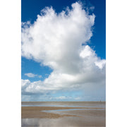 Wolken boven het strand