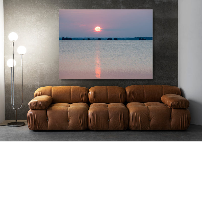 Gloeiende Zon boven het Water