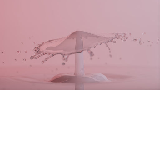 macro-opname van 2 druppels water die op elkaar botsen in melk in roze tinten