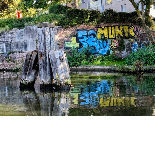 In Mechelen kan je mooie grafiti vinden langs de boorden van de Dijle, die ook weerspiegelt in het water.