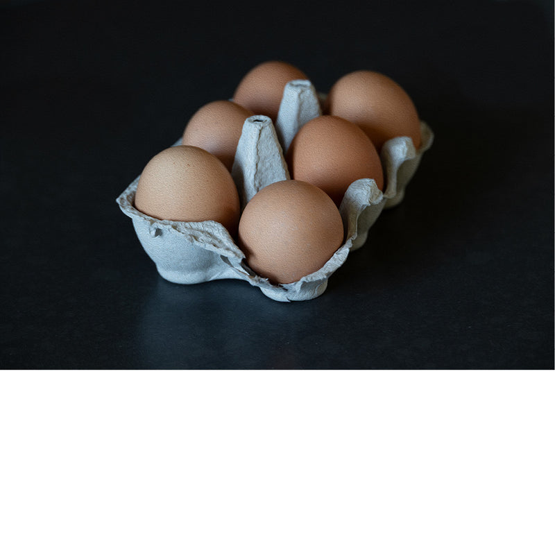 Doosje eieren met een veegje