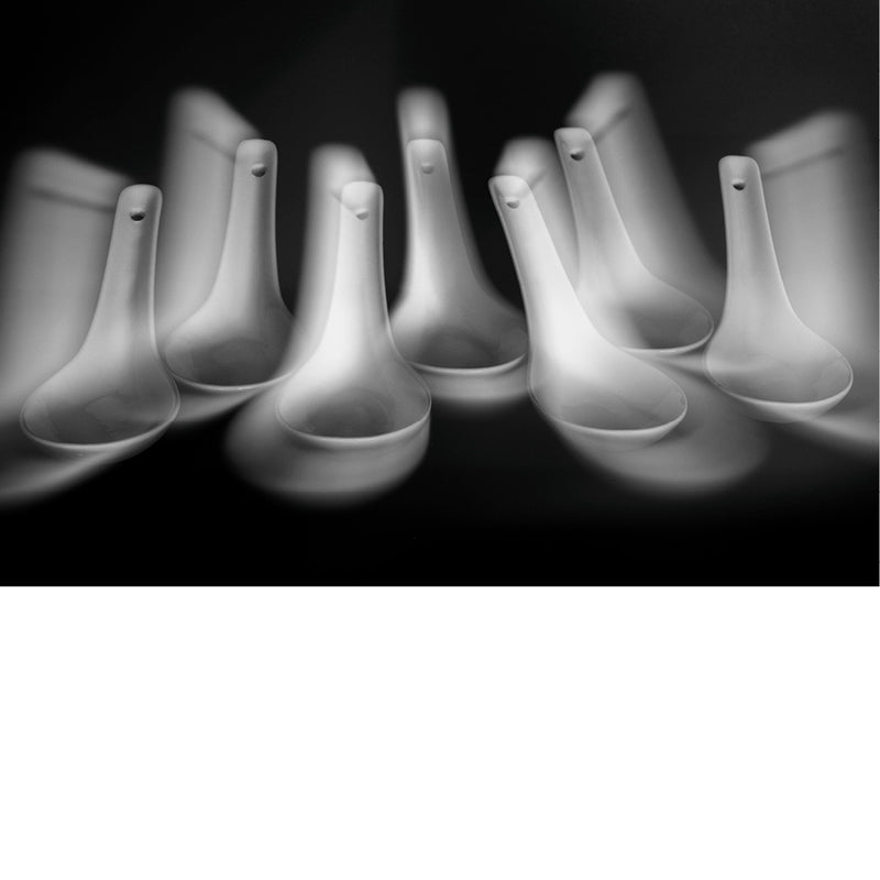 Chinese lepeltjes met lange sluitertijd en bewegingsonscherpte