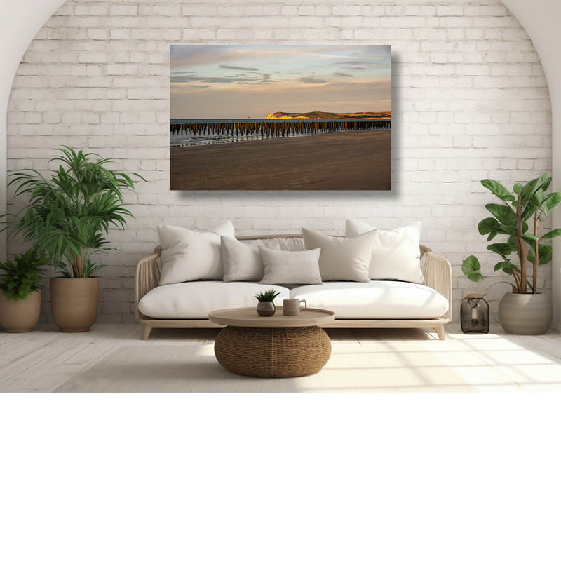 Muur van strandpalen