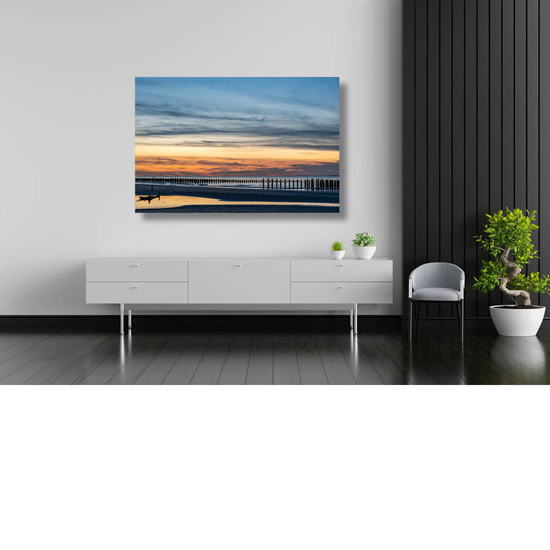 Tinten van blauw tot geel op het strand