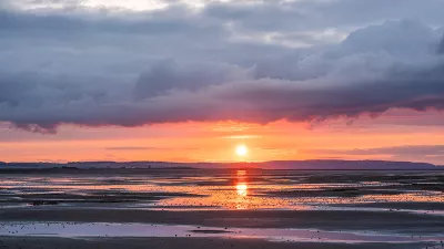 Kleurenspel tijdens zonsondergang, de foto