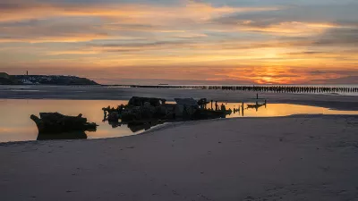Avondbeeld op het strand, de foto