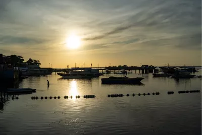 Gouden gloed op het water, de foto